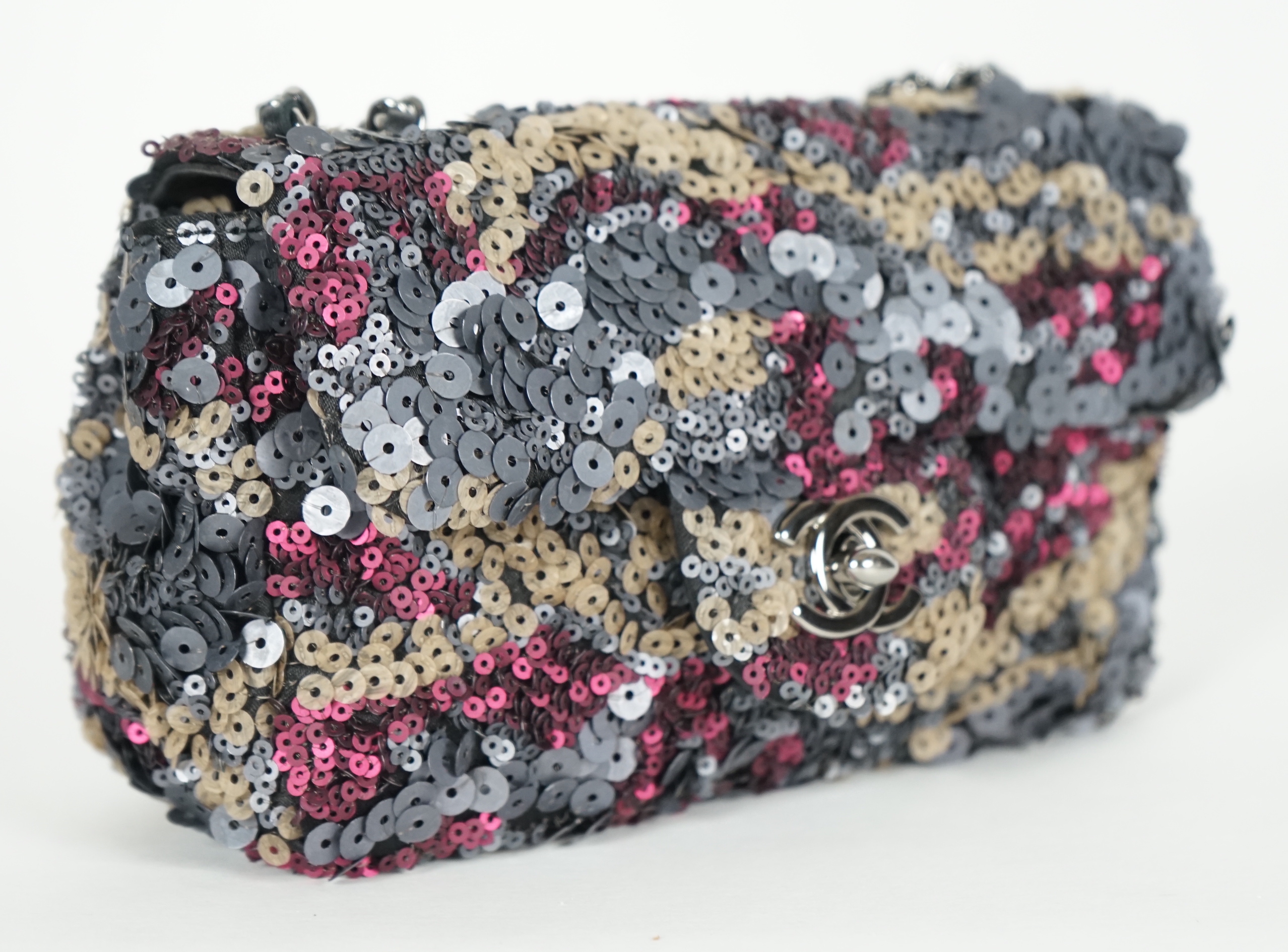 A Chanel 2012 Classique sequined mini shoulder bag, height 11cm, height overall 36cm, width18cm, depth 6.5cm, Please note this lot attracts an additional import tax of 20% on the hammer price